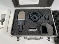 A pre-owned AKG C214 Professional Large-Diaphragm Condenser Microphone.