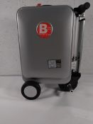 A pre-owned Airwheel SE35 ride on suitcase, no battery or charger.