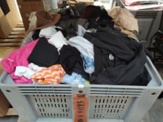 A large quantity of assorted pre-owned clothing and related. (Container not included)