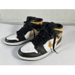 A pair of pre-owned Nike Air Jordan high top (UK 6).