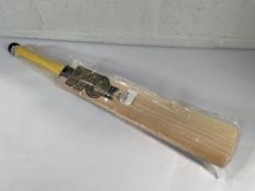 An as new GM Psyche 808 Cricket Bat, size 5.