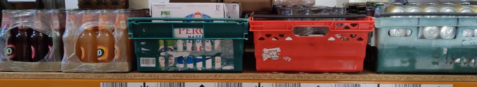 A quantity of assorted low alcoholic beers and soft drinks, to include Peroni 0.0%, J20, and related