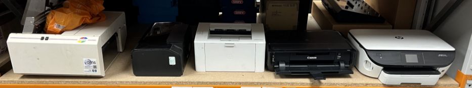 Assorted pre-owned printers.