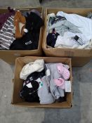 Three boxes of assorted as new clothing to include House of CB, Carhartt, Crocs, Zara (some without