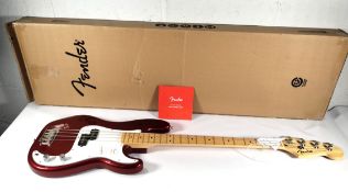 An as new Fender standard P bass guitar, box has slight damage and has been opened (MN WPG CND).