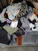 A quantity of assorted pre-owned clothing and related (stillage not included).