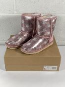A pair of children's Ugg classic short 2 sequin star boots (UK 3).