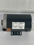 A Century AC motor (serial number 11024J2).