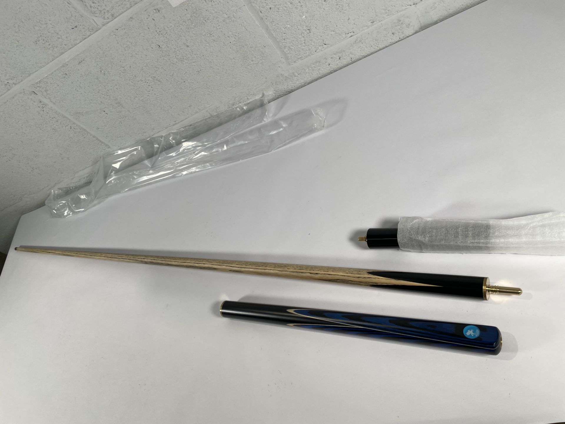 An as new Pegasus 3/4 jointed ash snooker cue.