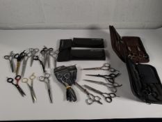 Twenty pairs of pre-owned hairdressing scissors to include Solingen, Olivia Garden (over 18s only).