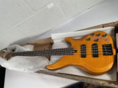 An as new Yamaha TRBX604FM bass, Matte Amber (SN: ILN154366).