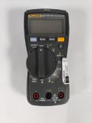 A pre-owned Fluke 117 handheld digital multimeter 600V AC/DC, 10A AC/DC.