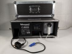 Pre-owned Beamz F-1600 smoke dry ice machine in flight case. No instructions.