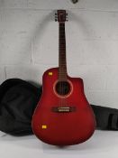 A pre-owned Art & Lutherie Spruce acoustic six string guitar with travel case.