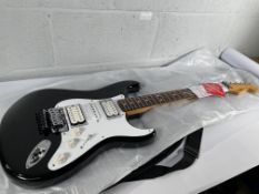 A boxed as new Fender Limited Edition Iron Maiden 50th Anniversary Dave Murray Stratocaster, black (
