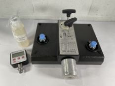 A Budenberg BGH1200C Hydraulic Comparator Tester Base and BG200 Digital Gauge with accessories.