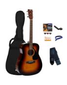 An as new Yamaha F310 Pack, acoustic guitar starter pack (stock image).