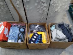 Three boxes of assorted as new clothing, mostly with tags to include Lululemon, Zara and related.