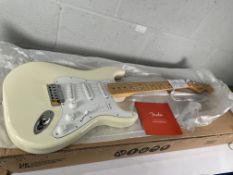 An as new Fender Standard Series Stratocaster in Olympic White (SN: ICF25020561).