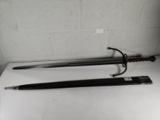 A pre-owned Replica sword and sheath (over 18s only).