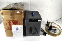 A pre-owned Baoshishan aquarium water chiller for fish tank -160L/42Gal, box opened (‎FBA-297CYL).