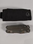 A pre-owned Leatherman Charge Titanium multitool.