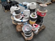 A pallet of assorted cables, reels and related.