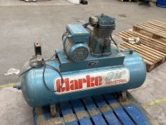 A pre-owned Clarke SE18C200 Electric Powered Industrial Air Compressor.