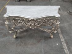 A marble top entrance desk with mirror.
