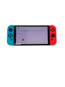 Pre-owned Nintendo Switch OLED Handheld Console (M/N: HEG-001).