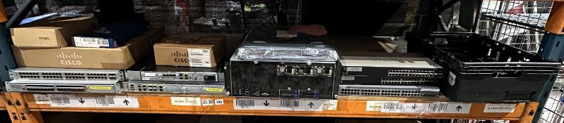 Assorted networking and IT hardware including Cisco, Gigabyte & Juniper (Sold as is).