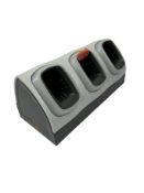 As new Zebra CRD-MC18-3SLCKH-01 3-Slot Locking Cradle for MC18 (Box open).