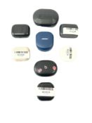 Assorted pre-owned wireless earphones and cases including Beats and Bose (Sold as is).