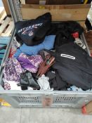 A quantity of assorted pre-owned clothing and related (stillage not included).
