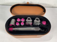 A pre-owned Dyson Airwrap with accessories (US Only 120V).