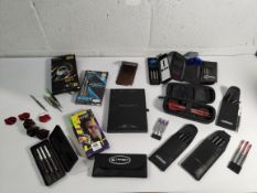A quantity of pre-owned darts and related items.