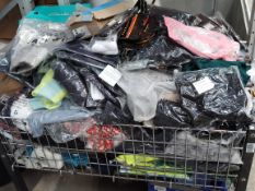 A large basket of assorted as new clothing and related (basket not included).