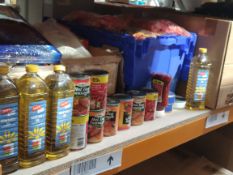 A shelf of assorted in-date food and drink products.