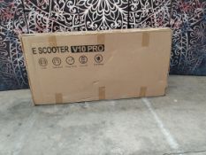 A boxed V10 Pro E Scooter.