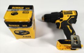 A Dewalt 18v brushless motor drill with an as new lithium ion 18v 5.0Ah XR battery (DCB184G)