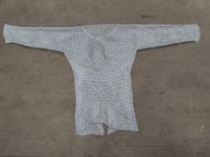 As new silver chainmail armour hauberk. Approximately 48 inch chest, length 36 inches.