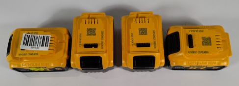 Four 2025 DeWalt XR 18v power tool batteries.