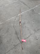 A pre-owned Delux flat bow, requires tensioning (over 18s only).