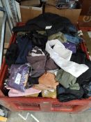 A quantity of assorted pre-owned clothing and related (stillage not included).