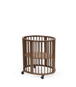 An as new Stokke Sleepi Mini, warm brown (stock image).