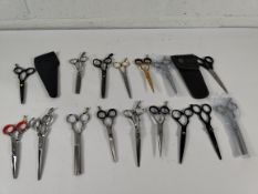 Eighteen pairs of pre-owned hairdressers scissors to include Sharpy, Haito, Titan (over 18s only).