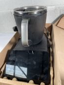 A Vorwerk Thermomix TM7 countertop kitchen machine.