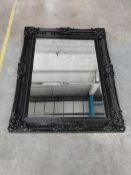 A French style ornate mirror.