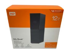 As new Western Digital My Book 12TB Desktop External Hard Drive (UPC: 718037872148) (Box sealed).