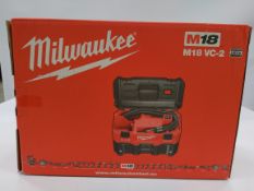 As new Milwaukee M18 VC-2 18V L-class extractor wet/dry vacuum - body and attachments only. Battery